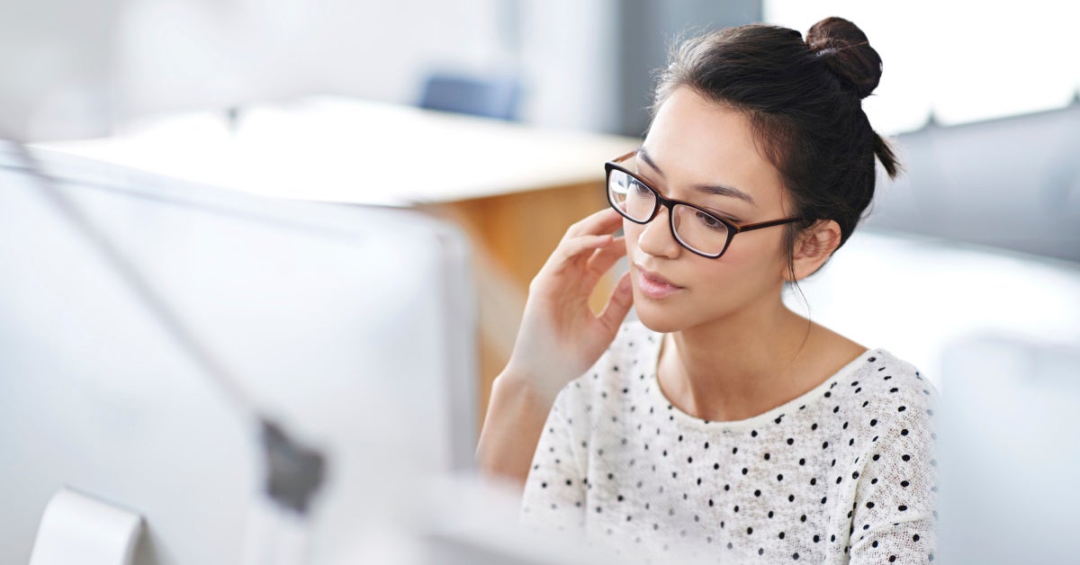 Woman looking at computer screen