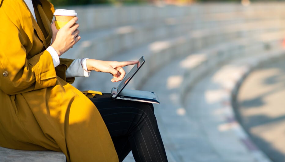 Woman checking laptop